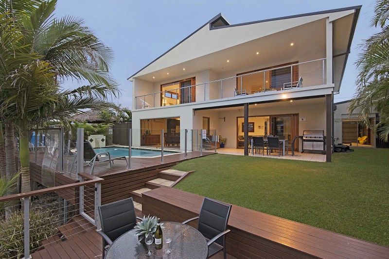 Beautiful waterfront living with pool and BBQ area